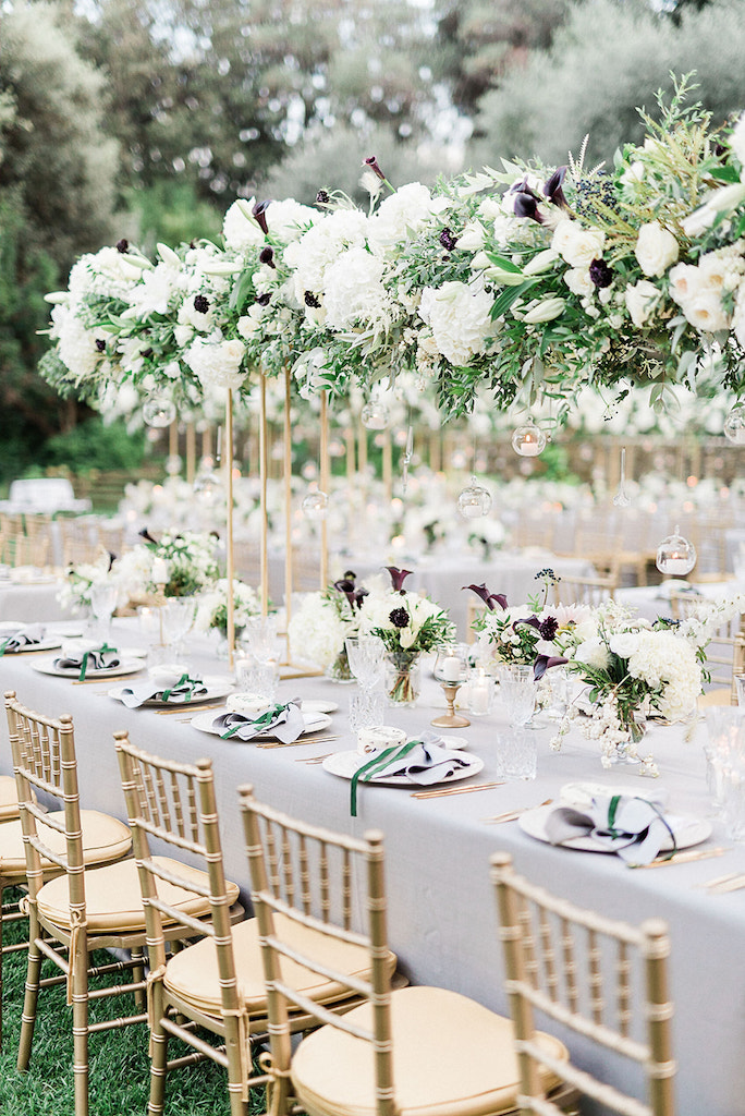 Tablescape with white and burgundy flowers