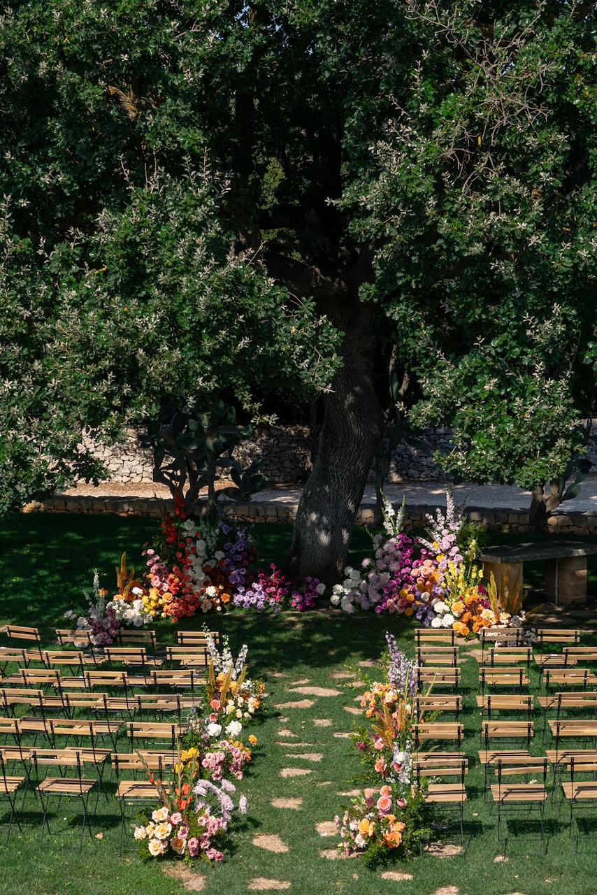 colorful flowers grounded floral arch and natural growths for Hindu wedding