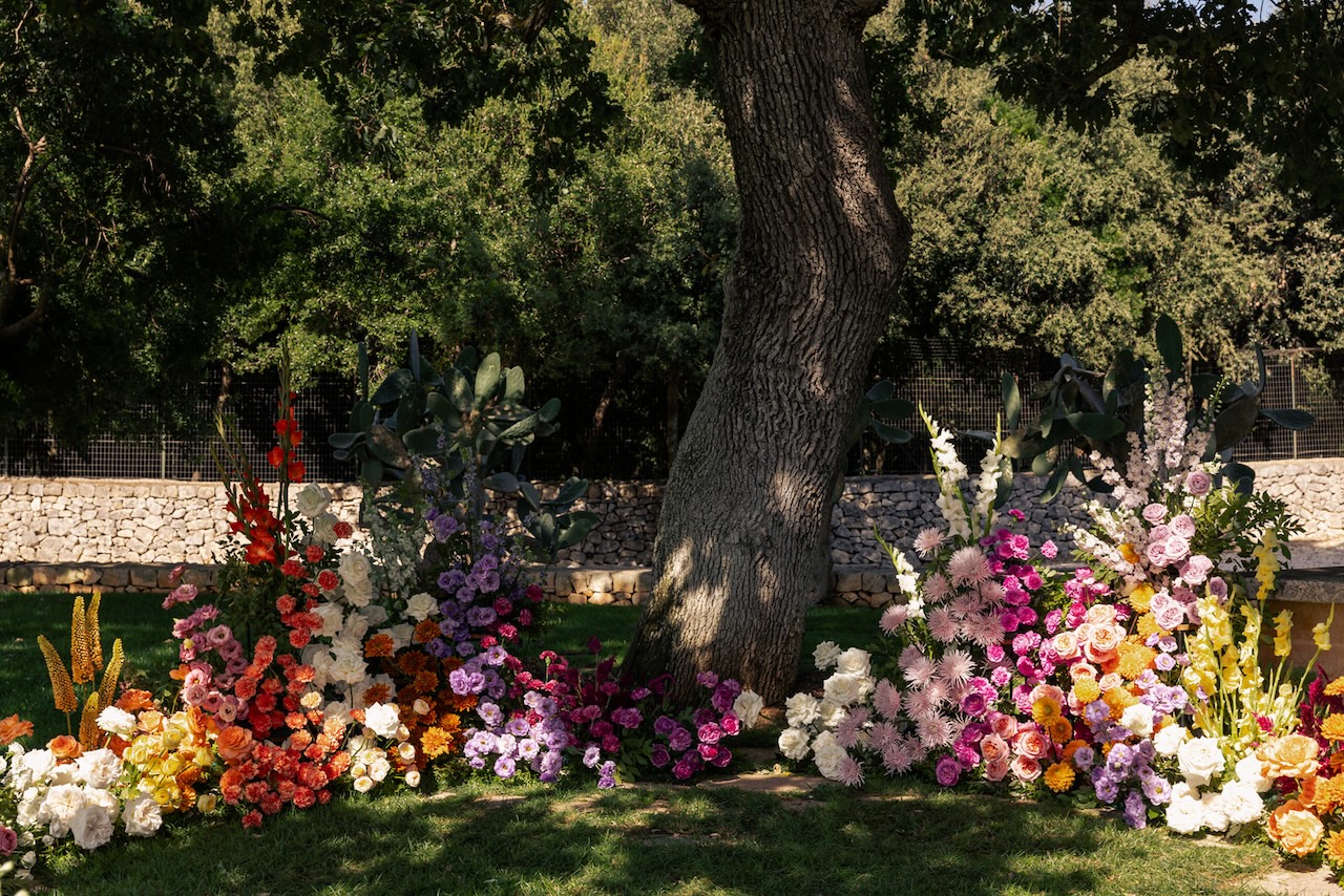colorful flowers grounded floral arch for indian wedding