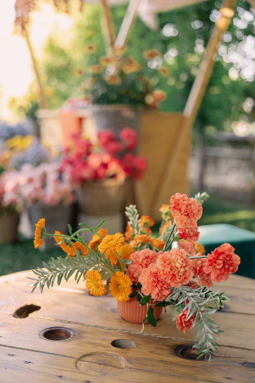 orange flower centerpieces for bangles ceremony