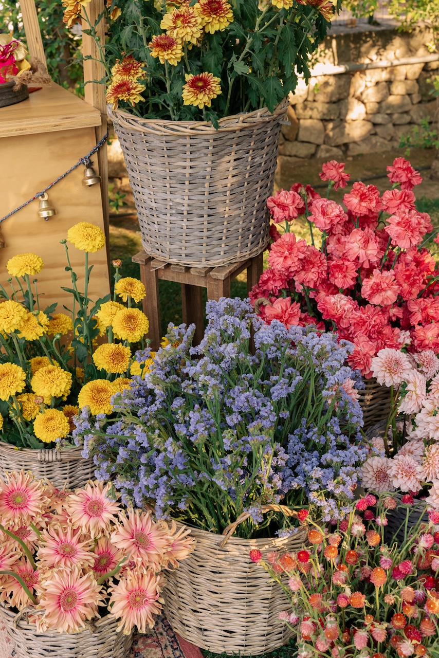wicker baskets full of color flowers for bangles ritual