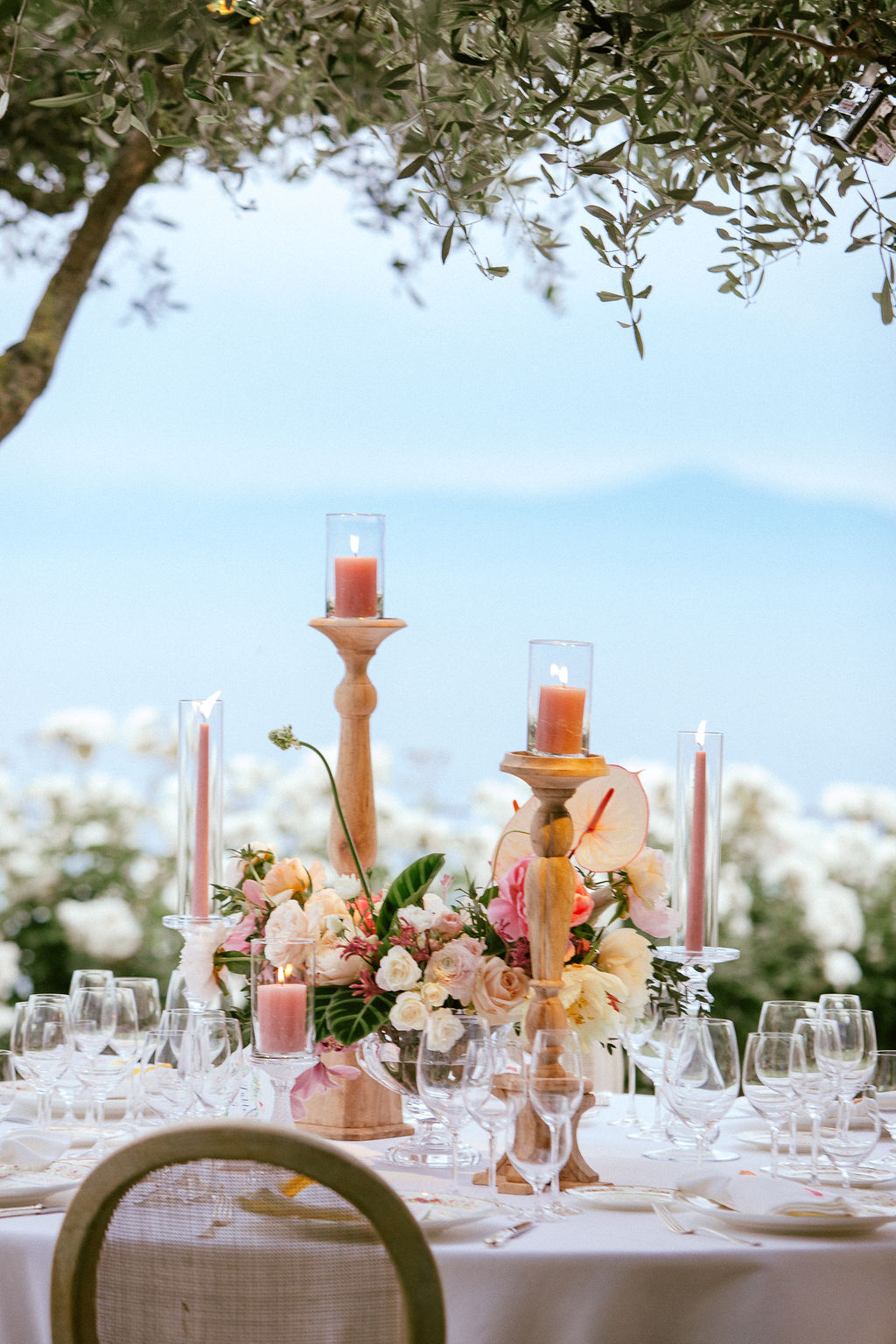 Pink candles matching the wedding palette